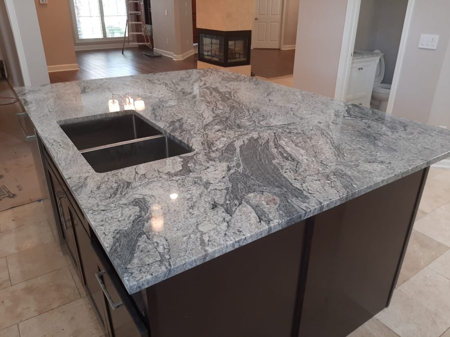 Expressive granite island for luxury residential kitchen design